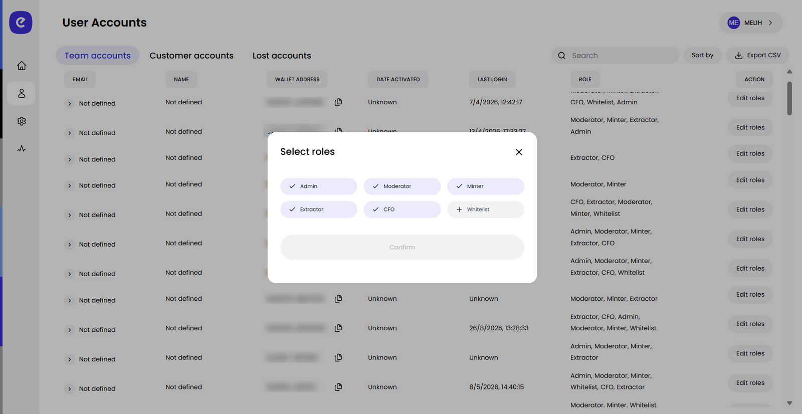Engage user accounts page showing team accounts and the select roles dialog